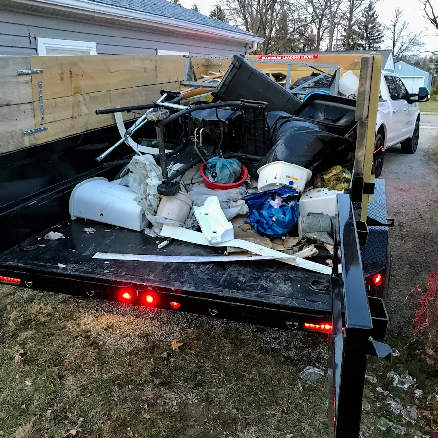 Roll-off dumpster delivered to a residential driveway in Demarest