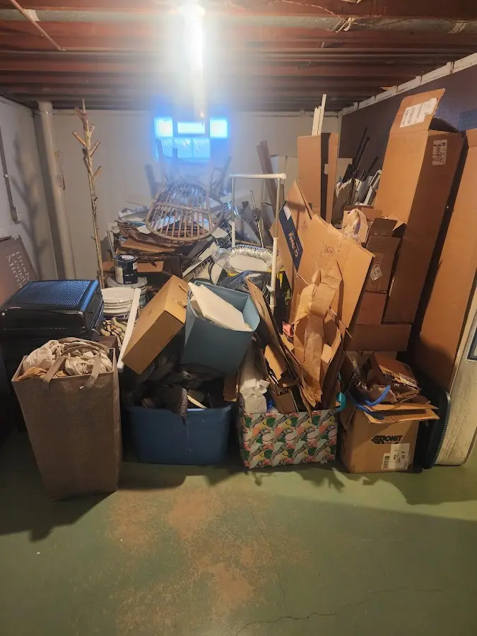 Roll-off dumpster container at job site for 2 Yard Dumpster Rental in Demarest